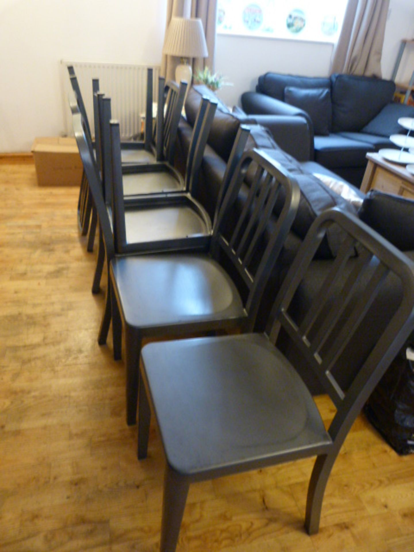 *Eight Stackable Metal Chairs