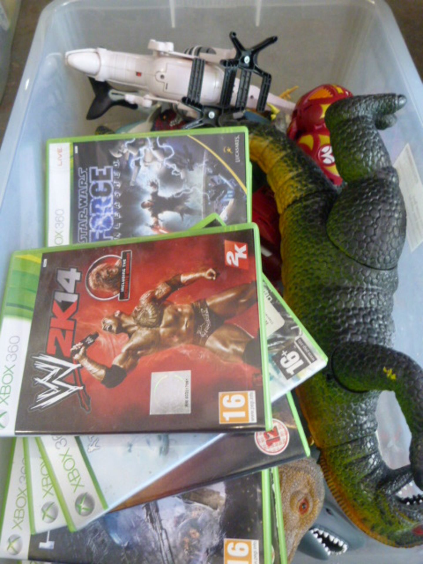 Box of Xbox Games, Toy Dinosaurs, etc.
