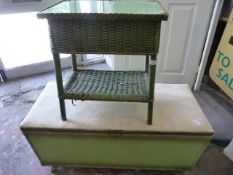 Green Ottoman and a Wicker Sewing Box