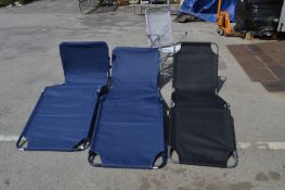 Three Garden Loungers and a Folding Garden Chair