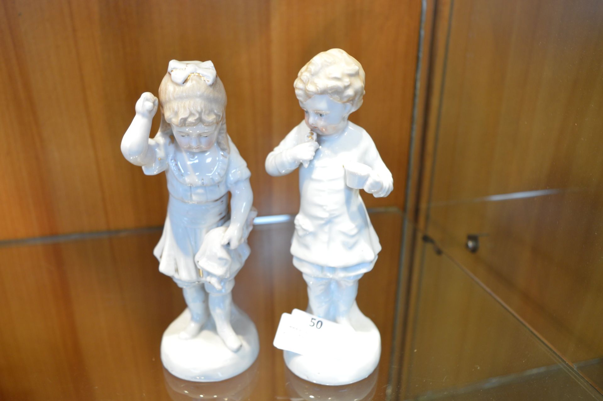 Pair of Early 20th Century Pottery Figurines - Boy