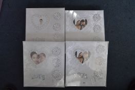 Four Wedding Photo Albums