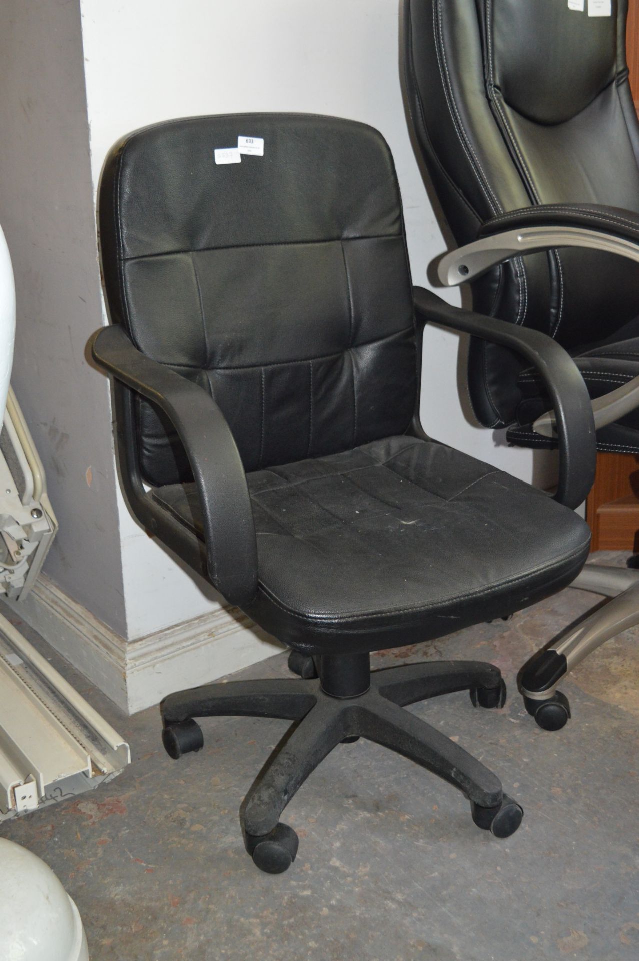 Black Vinyl Swivel Office Armchair