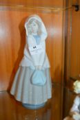 Nao Porcelain Figurine - Young Girl with Hooded Sh