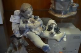 Lladro Figurine - Young Boy with Dog & Puppies