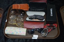 Tray of Various Reading and Sunglasses