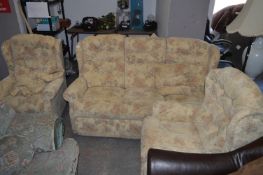 Brown Leaf Patterned Three Piece Suite; Three Seat