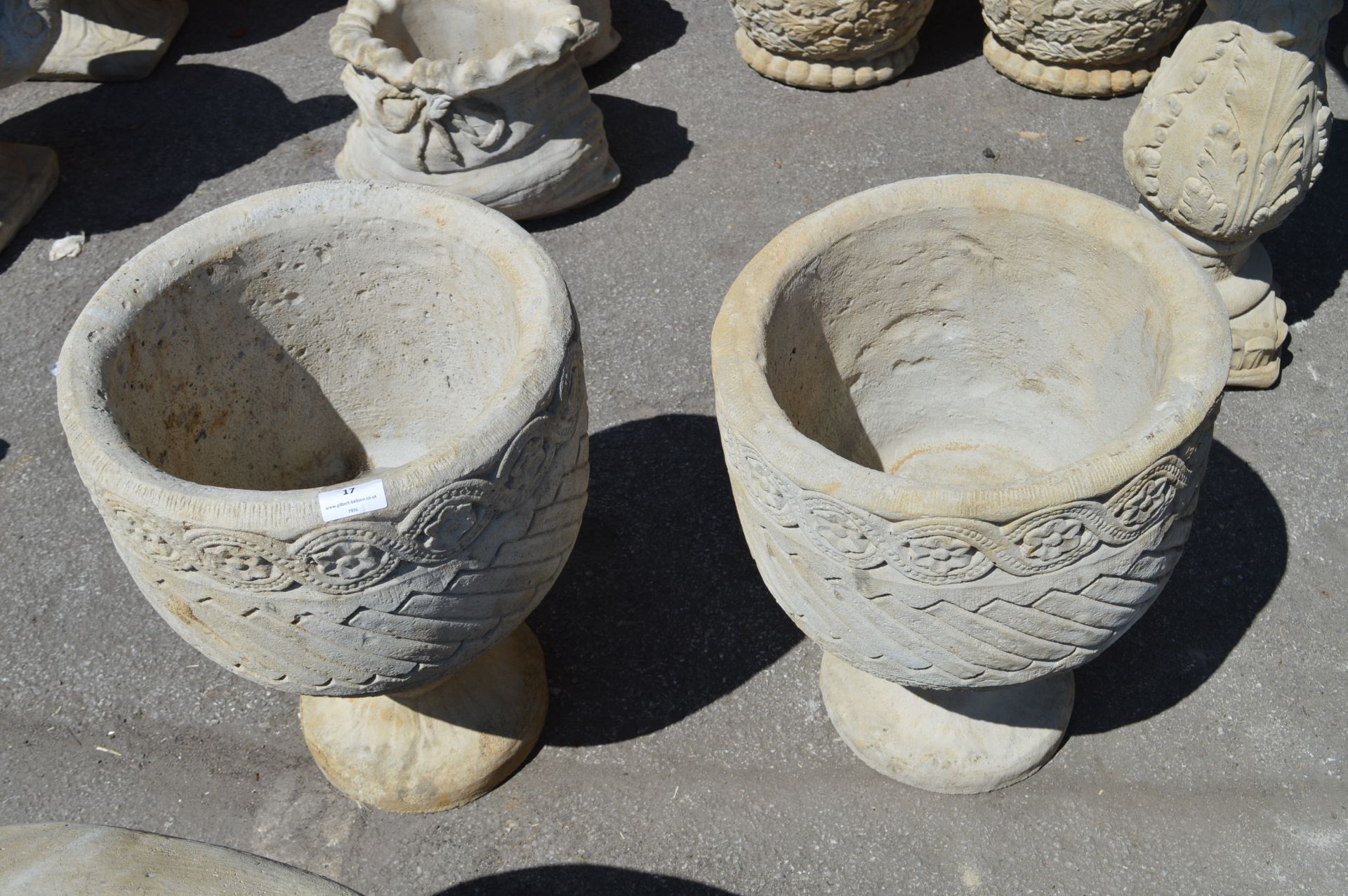 Pair of Reconstituted Limestone Planters with Bask