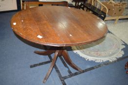 Oval Topped Oak Table on Pedestal Base