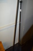 Two Black Tubular Metal Curtain Poles