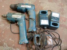 Two Makita Drills and Three Chargers