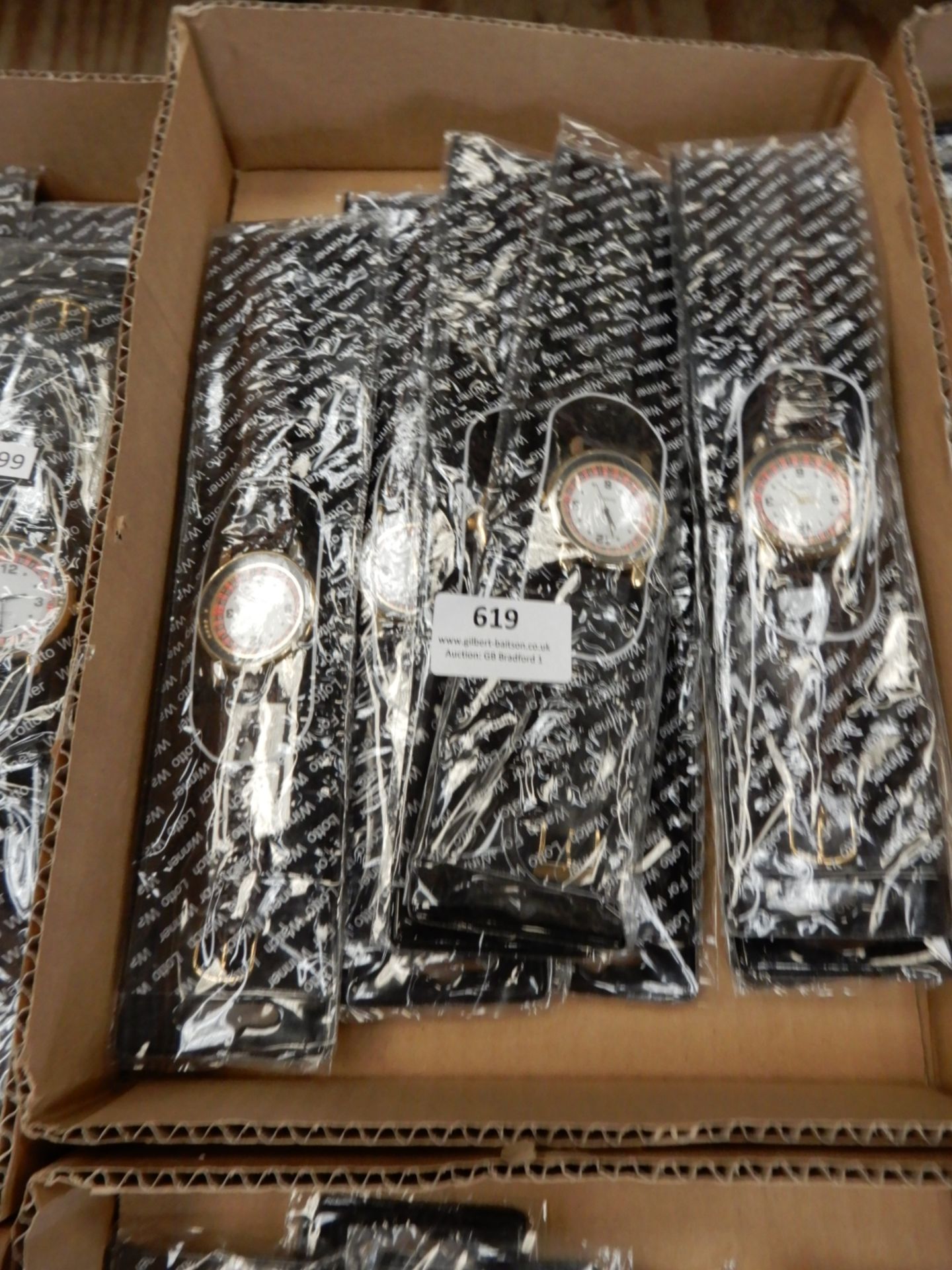 Box Containing 10 Wristwatches with Roulette Wheel