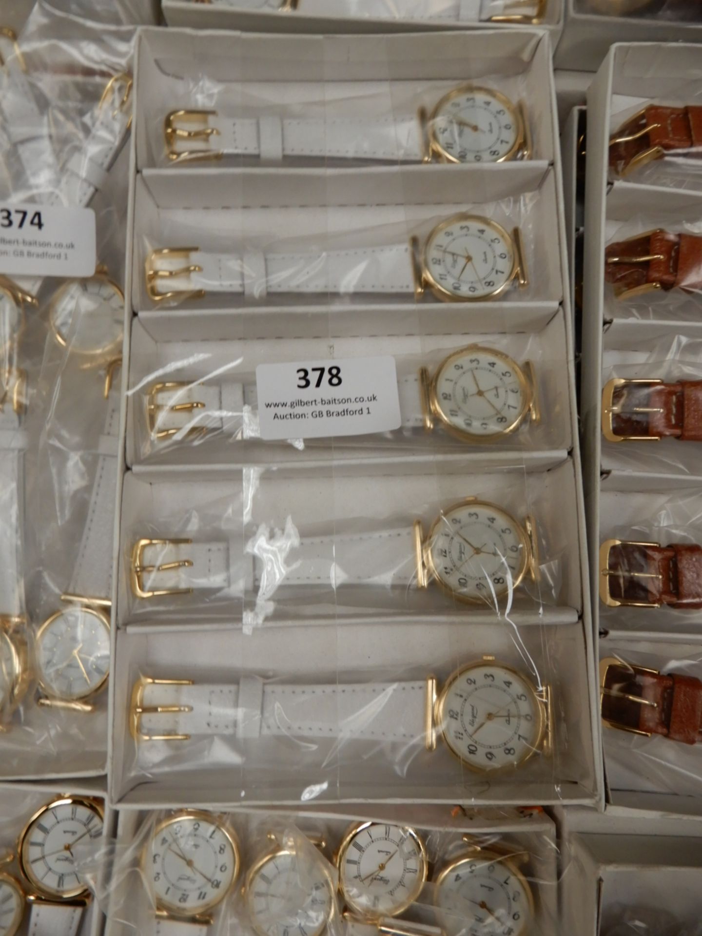 Box Containing 10 Ladies Fashion Watches with Whit