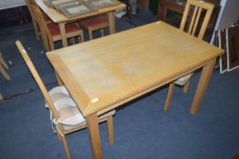 Light Oak Effect Rectangular Dining Table and a Pa