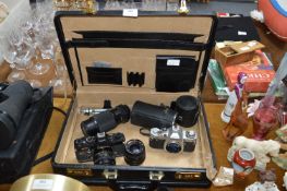 Two Canon Cameras AV1 and FTB with Lenses and a At