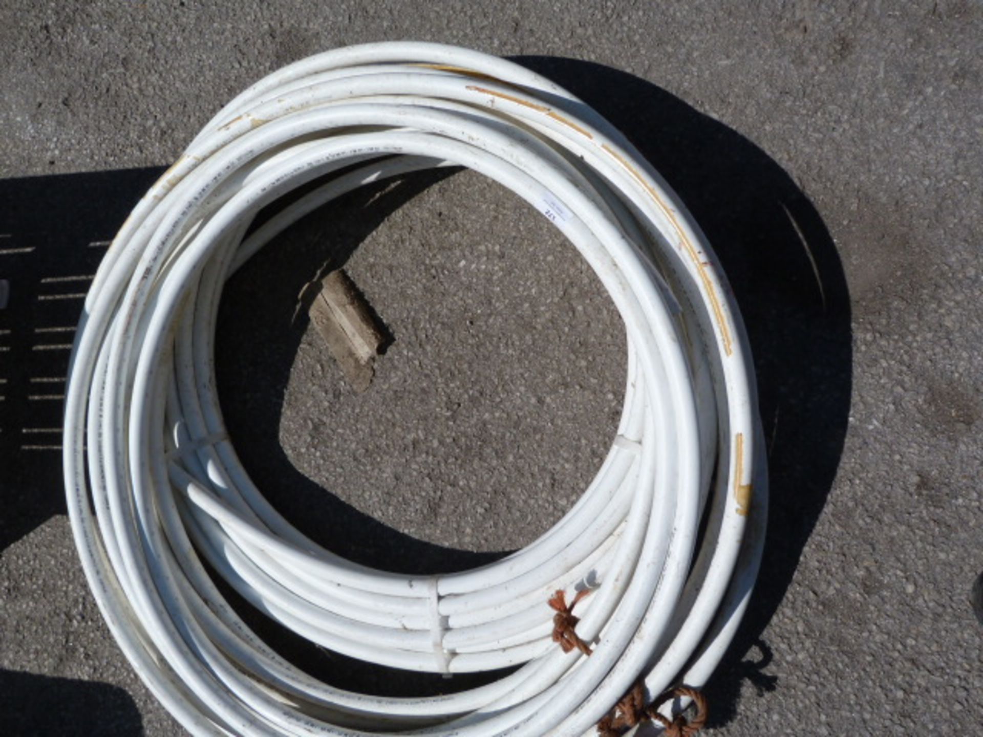 Two Coils of 22x2mm Plastic Piping