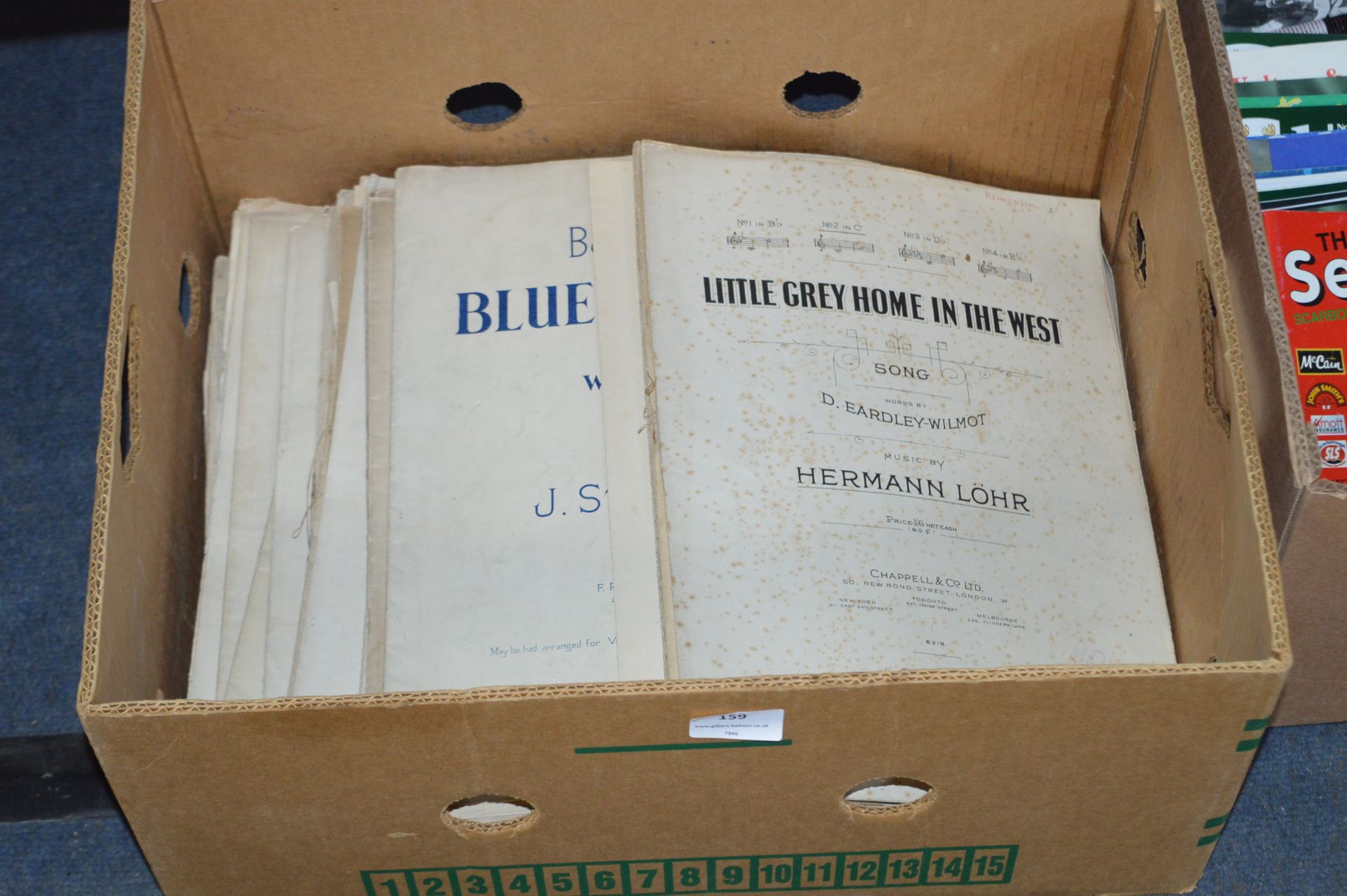 Box Containing Sheet Music