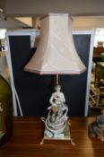 Pottery Figure and a Brass & Onyx Table Lamp with