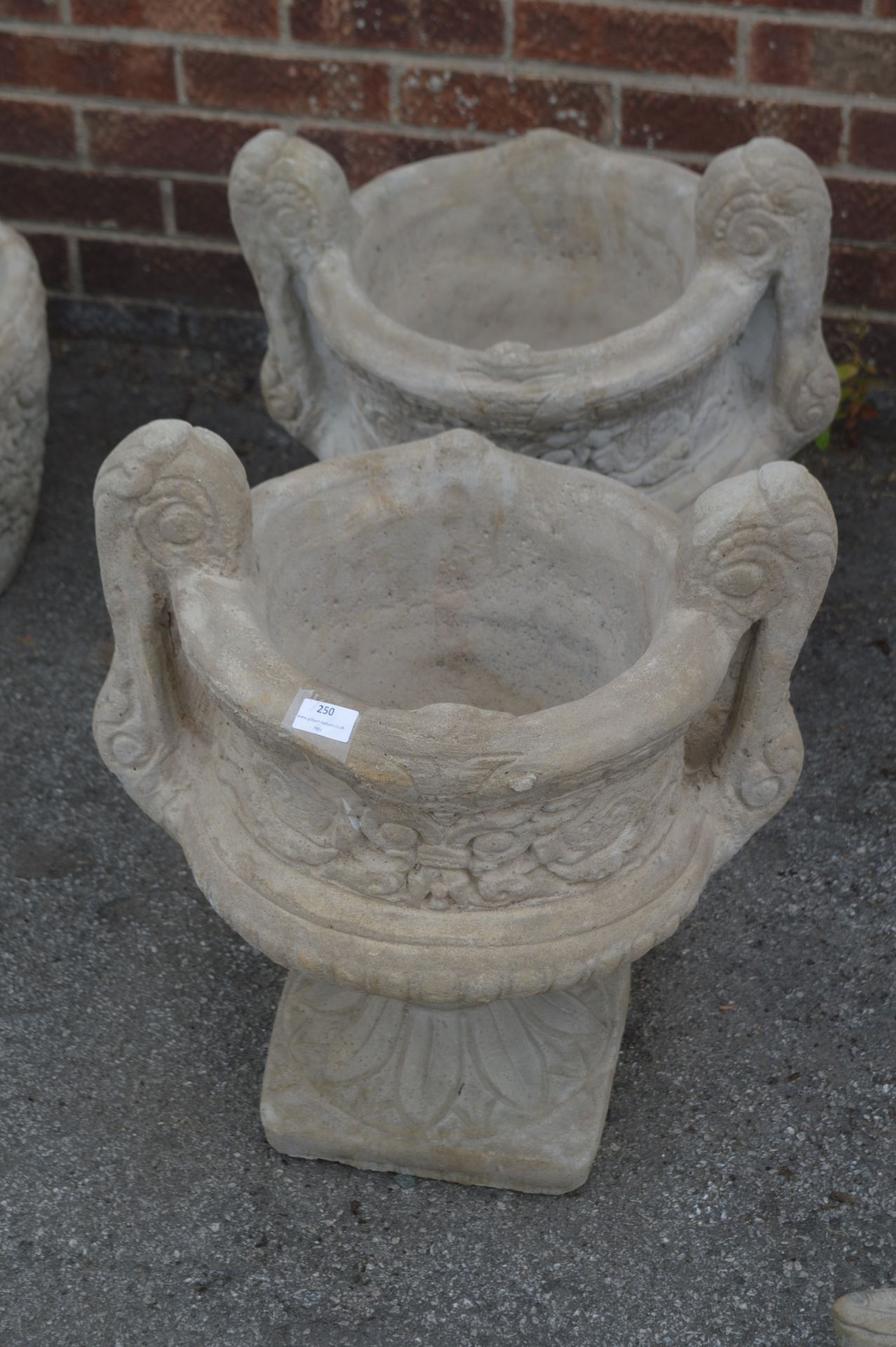 Pair of Reconstituted Limestone Garden Urns on Pli