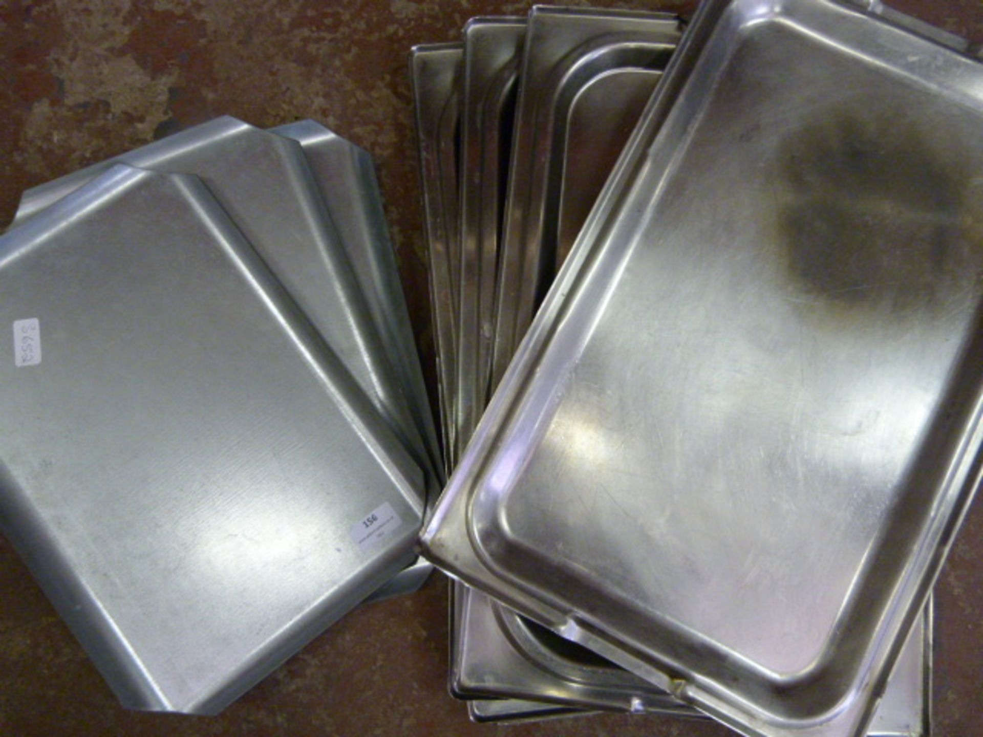 *Eight Stainless Steel Trays