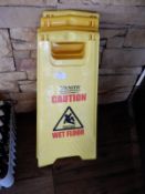 *Four "Caution Wet Floor" Signs
