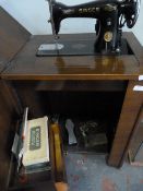 Singer Sewing Machine with Cabinet and Accessories