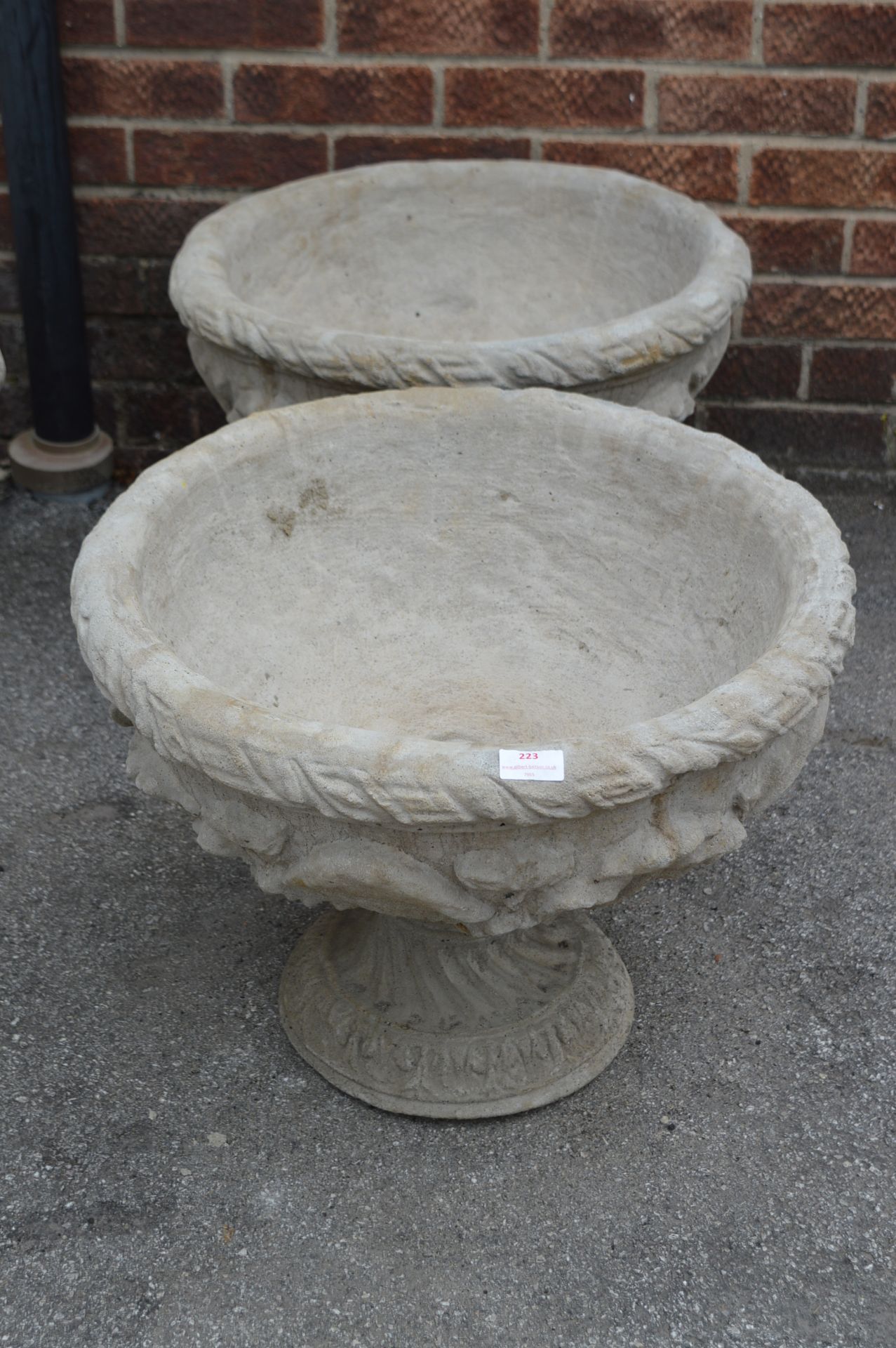 Pair of Reconstituted Limestone Garden Urns on Pli