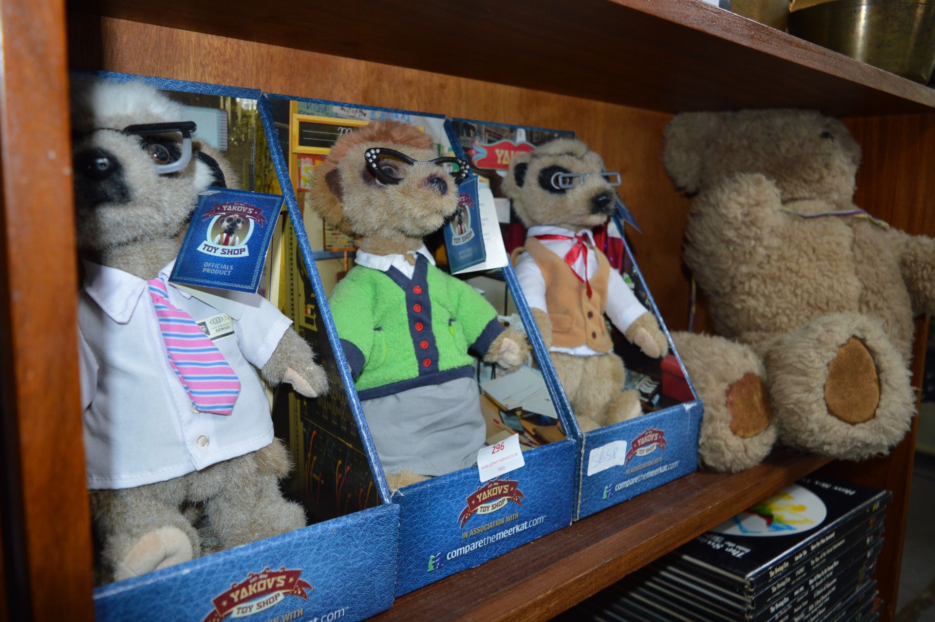 Three Meerkat Dolls and a Plush Teddy Bear