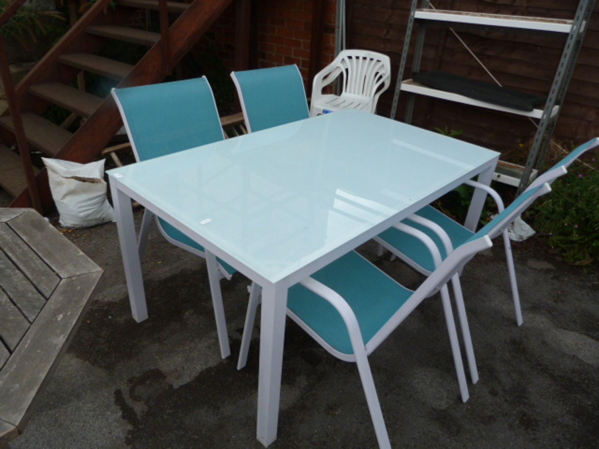 White Based Glass Topped Rectangular Patio Table with 4 Blue and White Chairs