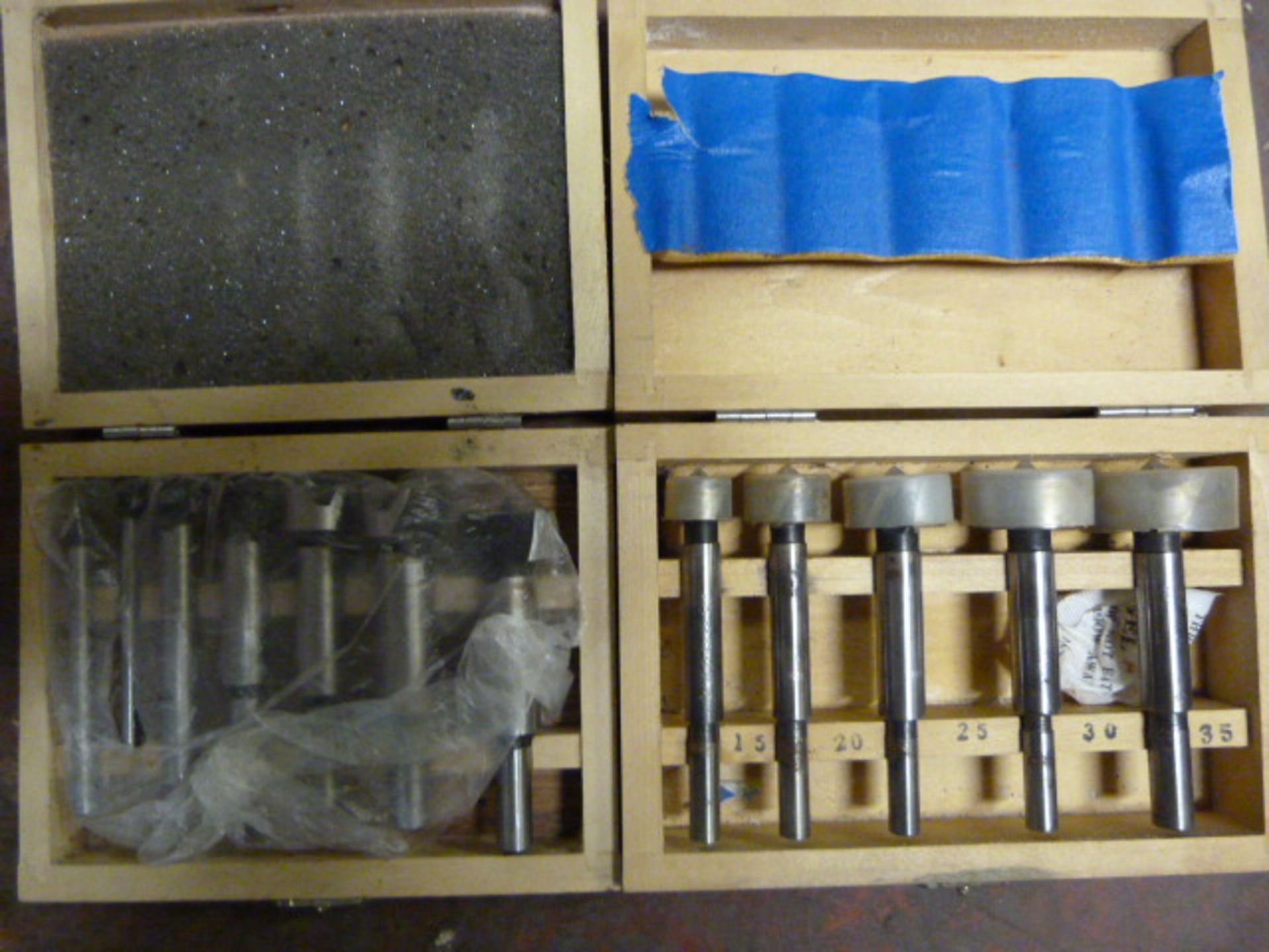 Two Small Boxes of Router Bits