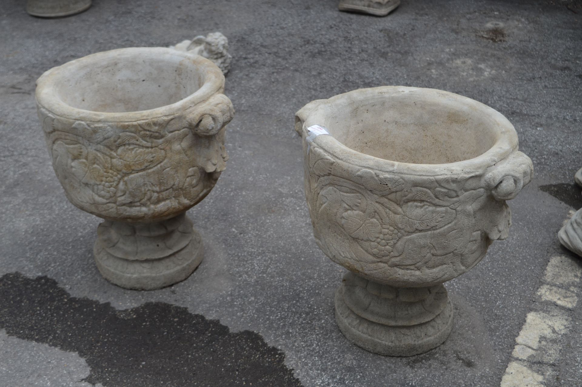 Pair of Reconstituted Limestone Garden Urns with B