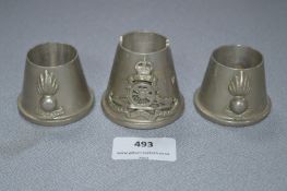 Set of Three WWI Trench Art Ashtrays with Military Badges, Fusiliers and Artillery