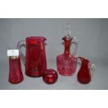 Cranberry Glassware, Decanter, Jugs, Sugar Sifter and a Small Vase