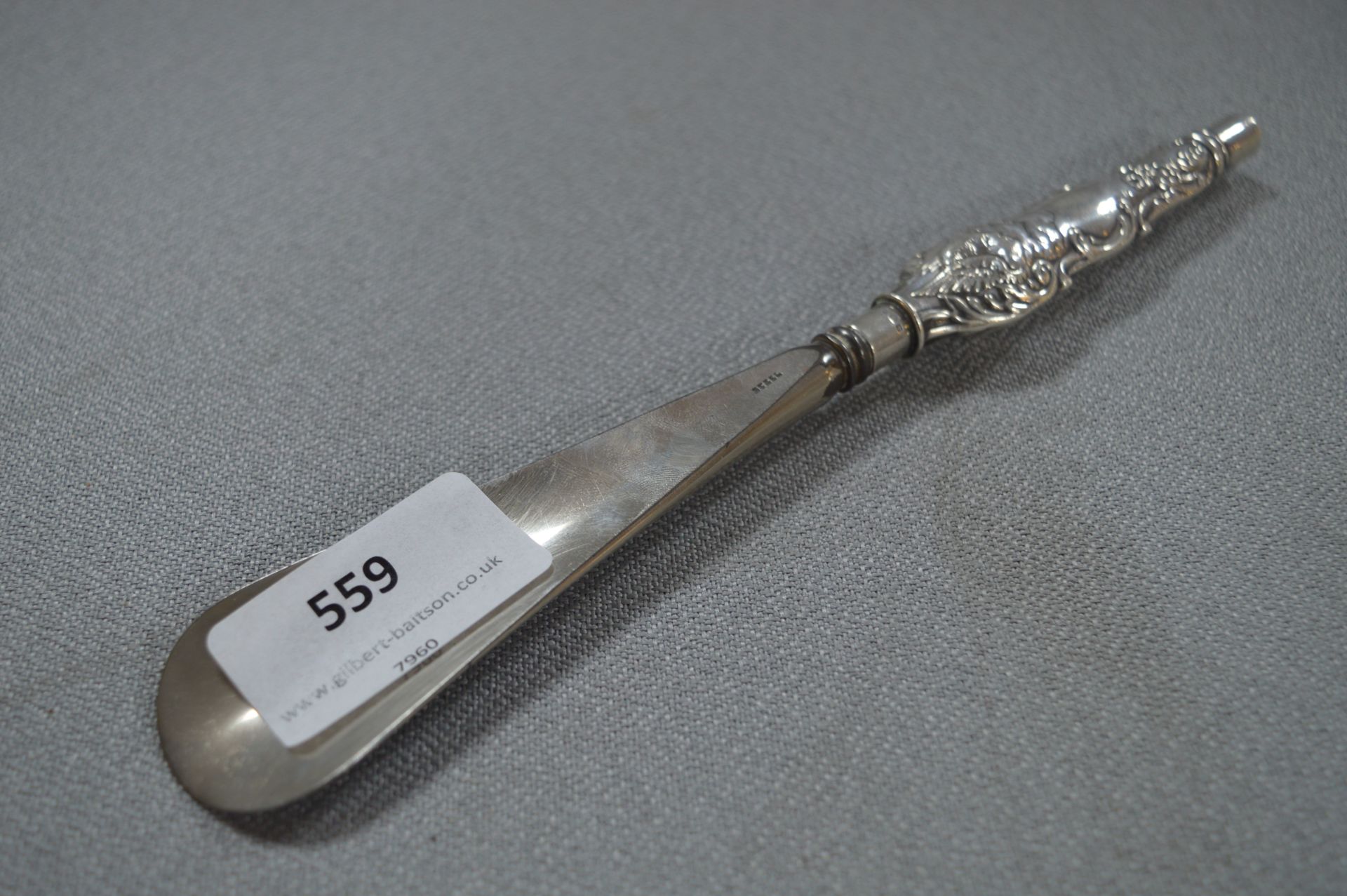 Hallmarked Silver Handled Shoe Horn with Cherub Design