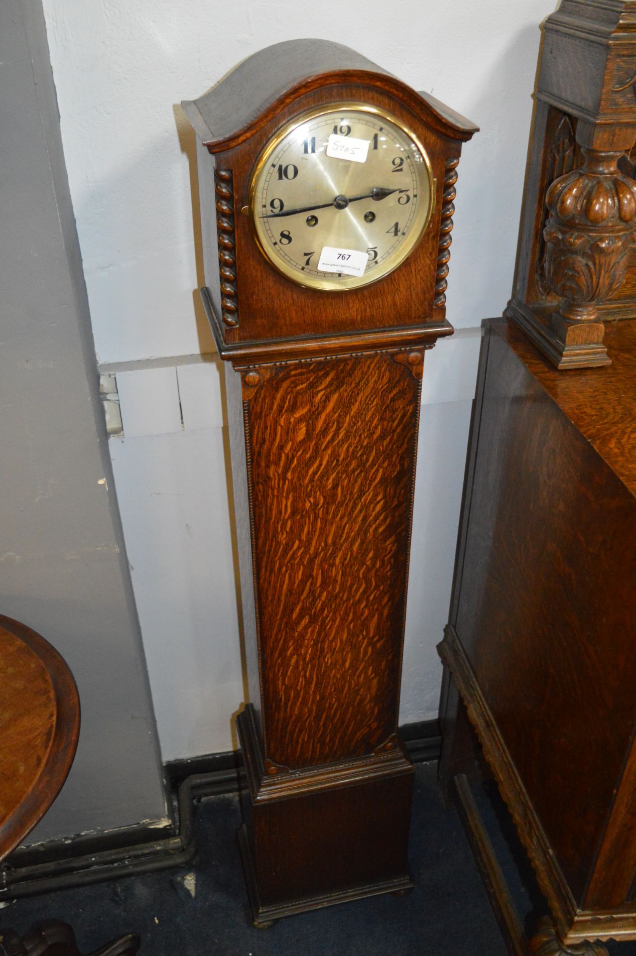 Oak Cased Granddaughter Clock with Barley Twist Decoration