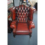 Oxblood Leather Buttoned Wingback Armchair