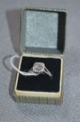 18cT White Gold Diamond Ring with 1.03ct Center Stone and Approximately 0.40ct Shank