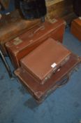 One Leather and Two Compress Cardboard Vintage Suitcases