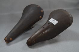 One Brooks and One Other Leather Bicycle Saddles