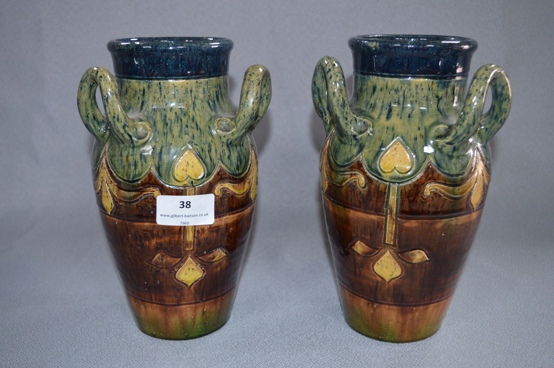 Pair of Art Nouveau Pottery Trio Loop Handled Vases