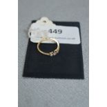 18cT Gold Ring Set with Three Diamonds