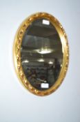 Gilt Framed Oval Bevelled Edge Wall Mirror