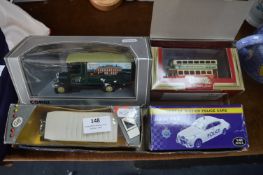 Four Boxed Diecast Model Vehicles