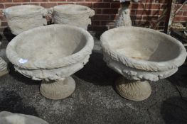 Pair of Reconstituted Limestone Garden Urns with F
