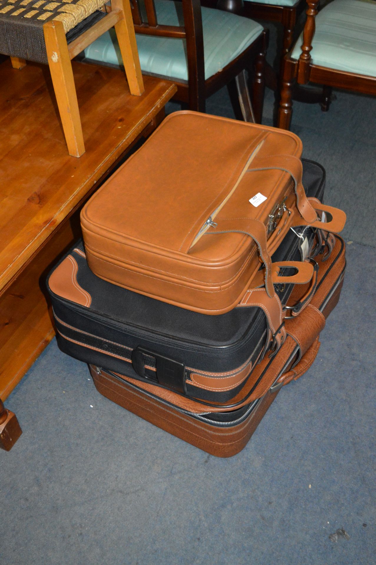 Three Assorted Travel Suitcases