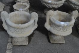 Pair of Reconstituted Limestone Garden Urns on Pli