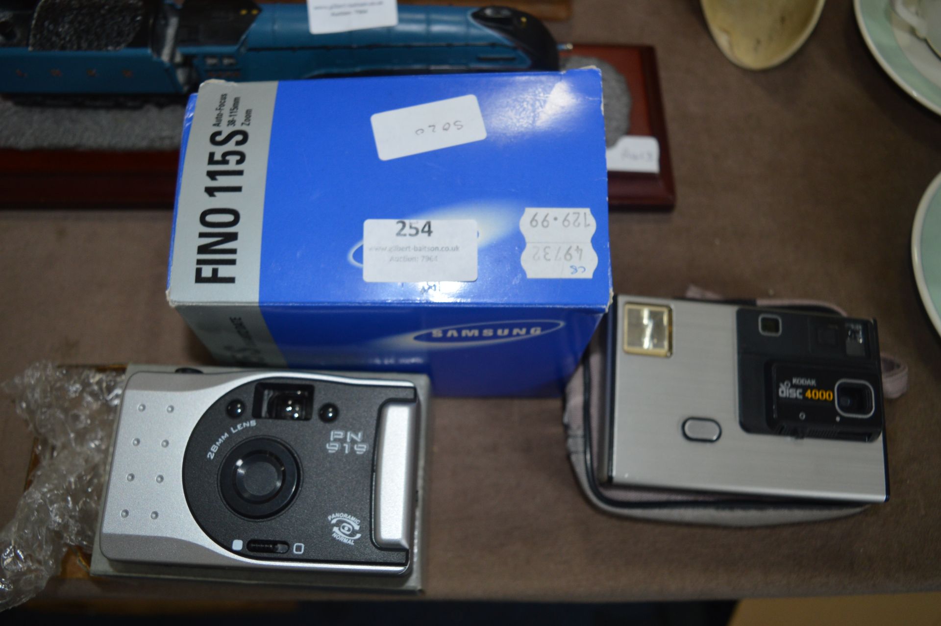 Three Cameras including Samsung, Kodak and One Other