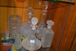 Four Glass Decanters and Two Vase