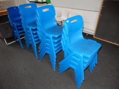 *Sixteen Stackable Blue Plastic Chairs