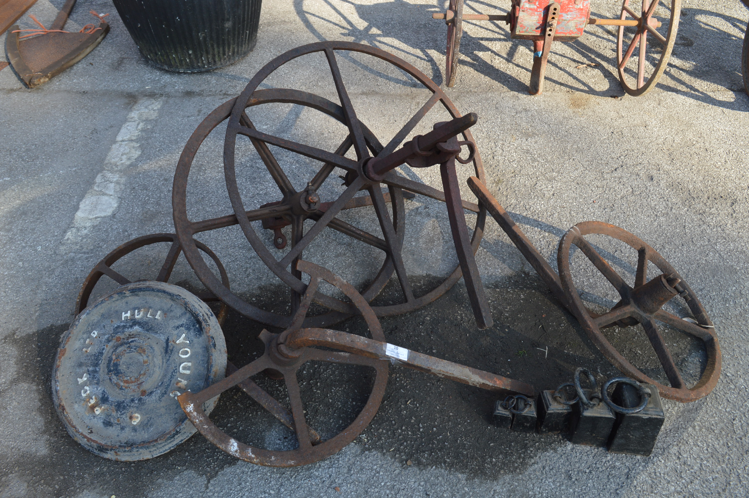 Selection of Farming Cast Iron Wheels and Named Wall Support Plate "Peck & Young of Hull"